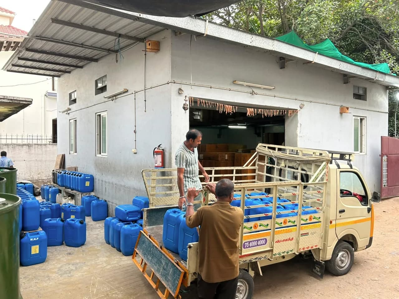 Covai Seenu staff preparing a material order for delivery